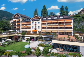 Отель Dominik Alpine City Wellness Hotel - Adults only  Бриксен